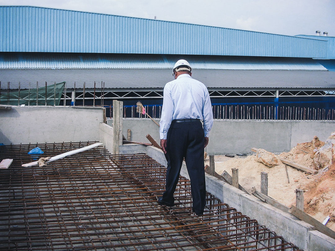 Inspector Checking Rebar